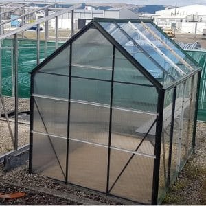 poly carb glass house